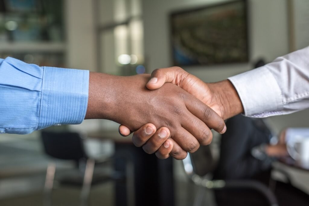 Business handshake agreeing on a Localanto local SEO plan